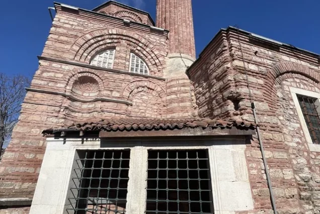 Guide at Zeyrek Mosque exterior