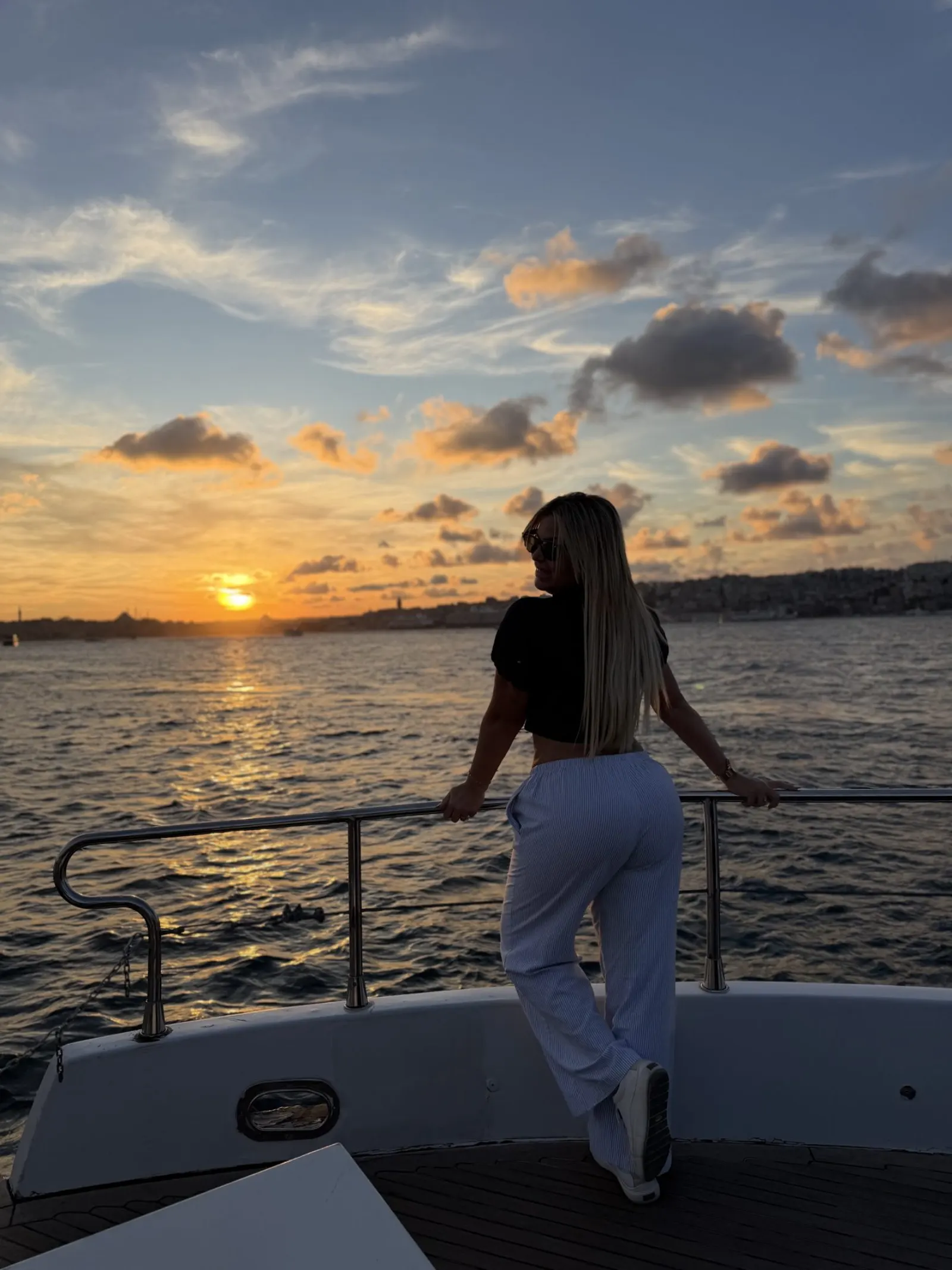 Guests on the open deck of an afternoon Bosphorus cruise